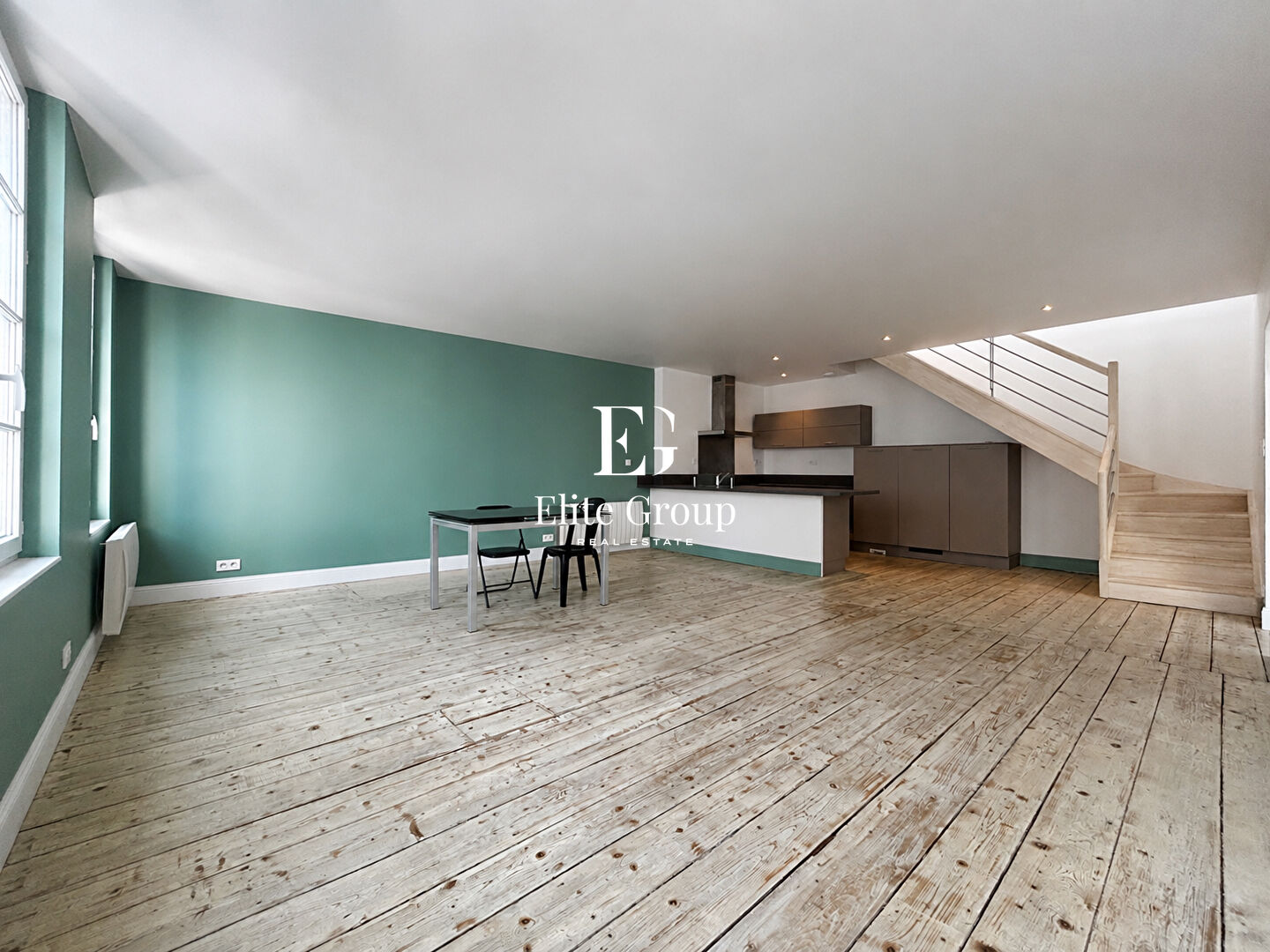Élégant appartement esprit maison de ville avec terrasse sur les toits