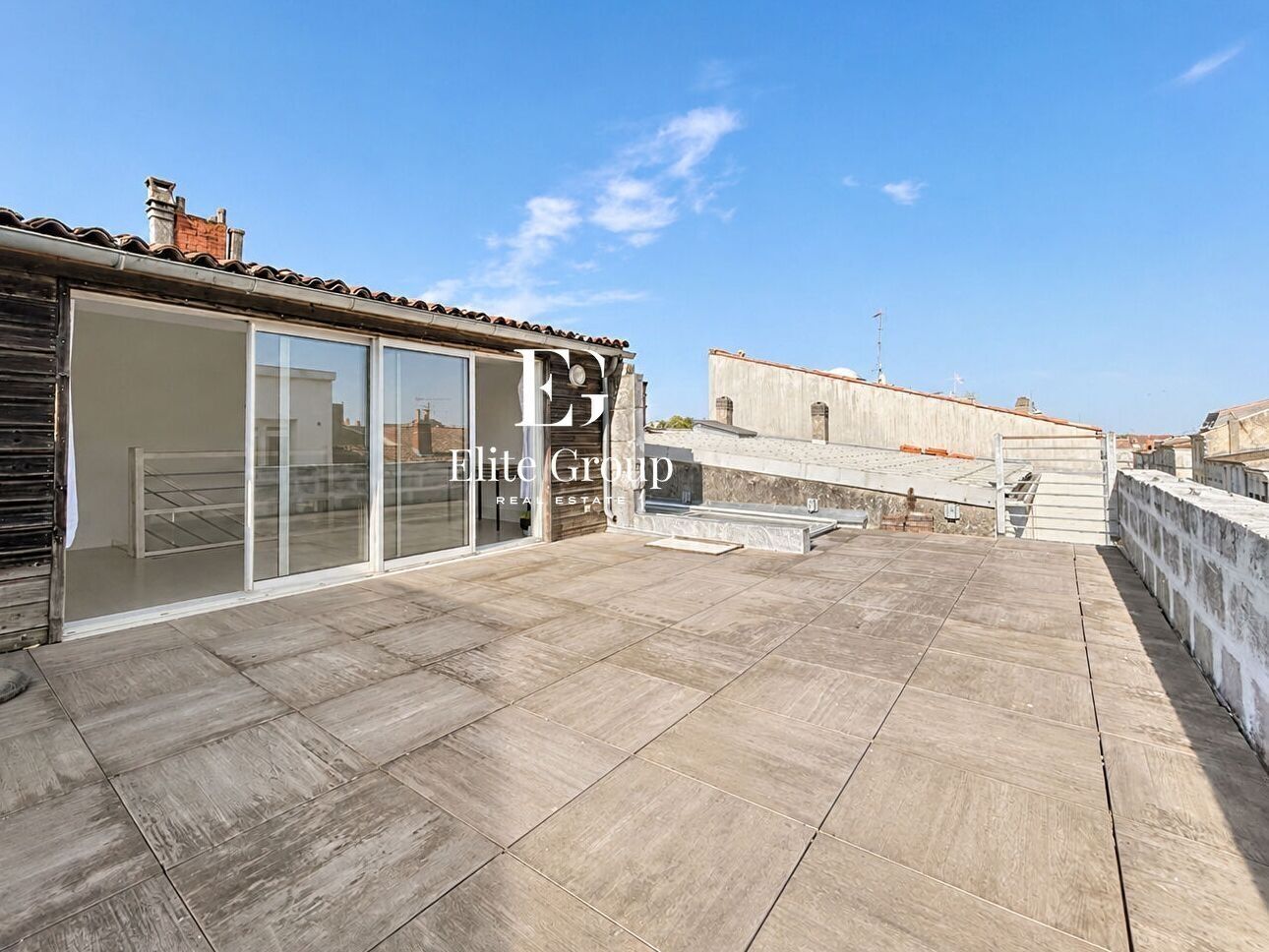Élégant appartement esprit maison de ville avec terrasse sur les toits